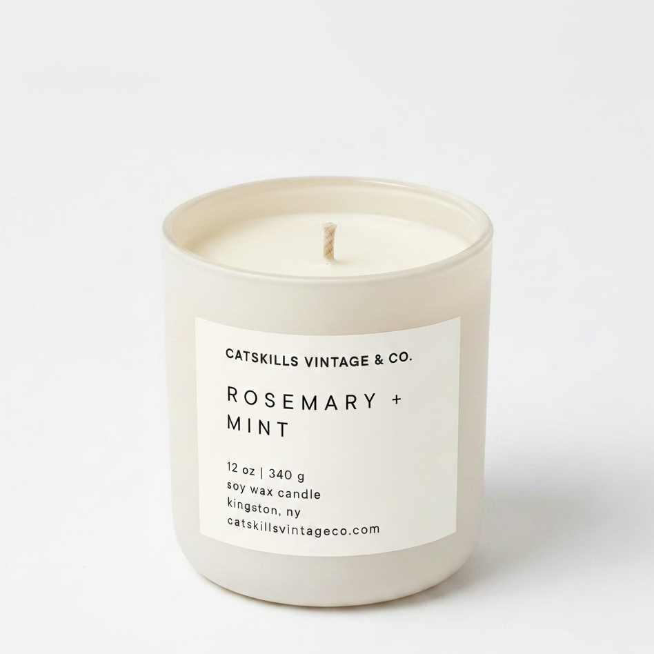 Rosemary + Mint 12 oz soy candle in cream matte glass jar