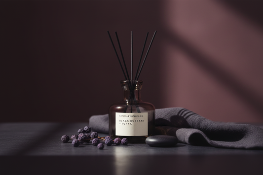 Black Currant + Tonka Reed Diffuser lifestyle on dark moody bathroom vanity