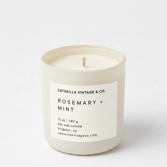 Rosemary + Mint 12 oz soy candle in cream matte glass jar