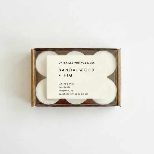 Tea Lights - Sandalwood + Fig kraft box with clear lid on white background