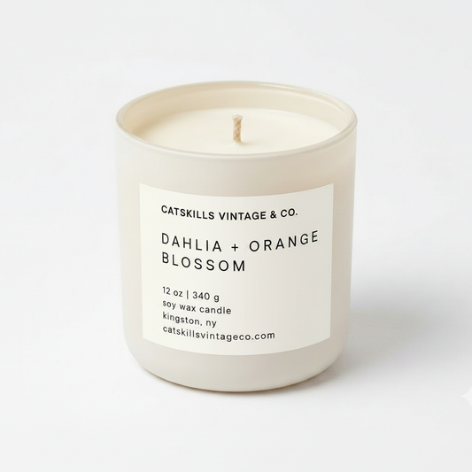 Dahlia + Orange Blossom 12 oz soy candle in cream matte glass jar